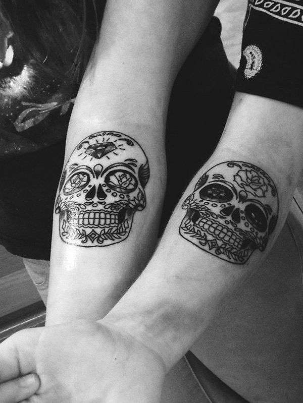 Tatuaje de calavera mexicana en pareja