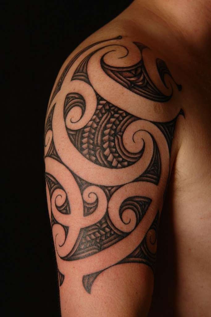 Tatuaje tribal espirales