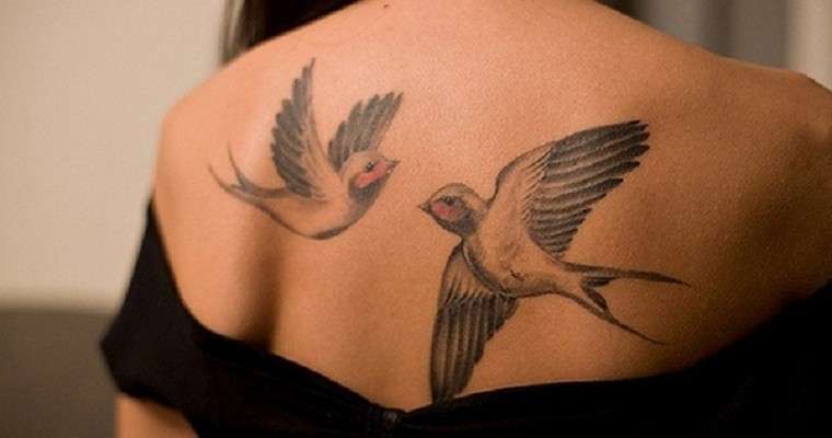 Tatuaje dos golondrinas