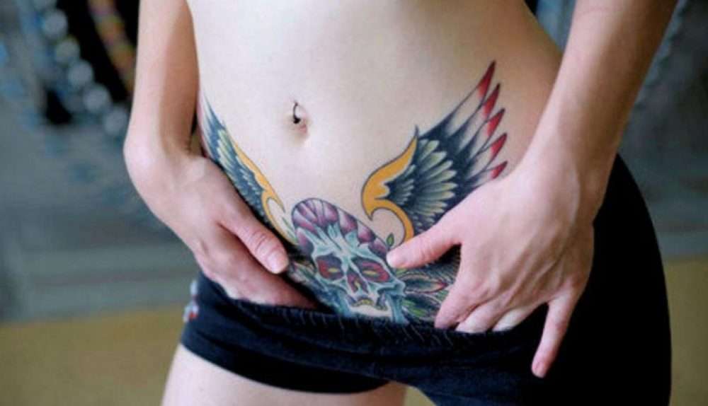 Tatuaje calavera y alas