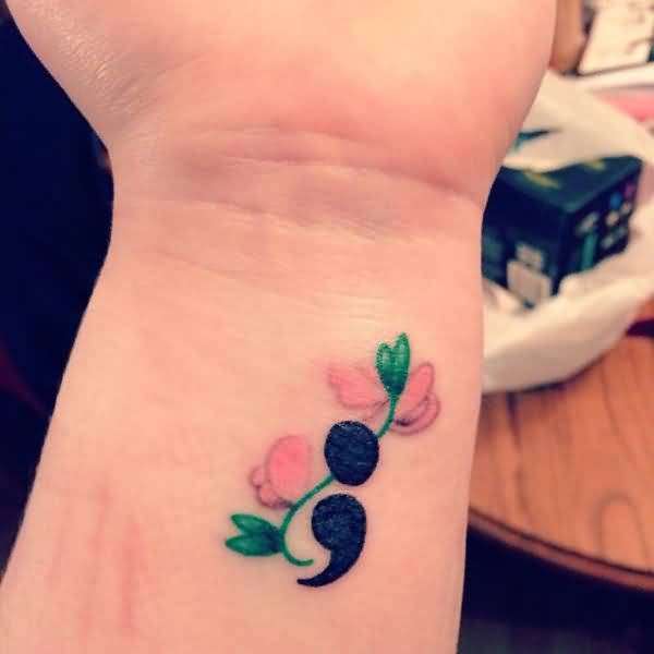 tatuering semikolon blomma