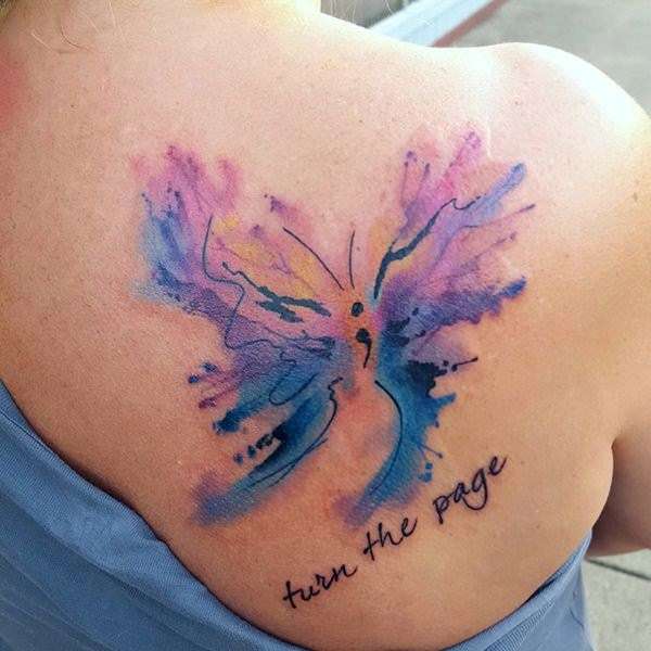 Tatuaje punto y coma mariposa