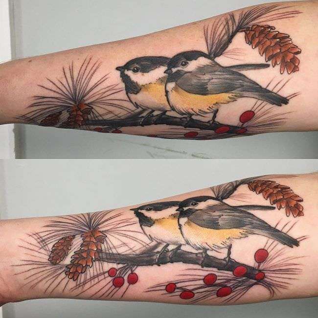 Tatuaje en antebrazo dos pájaros