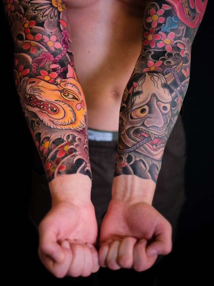 Tatuaje japonés ambos brazos