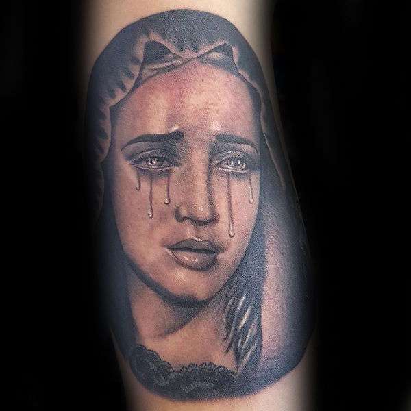 Tatuajes cristianos - rostro de la Virgen llorando