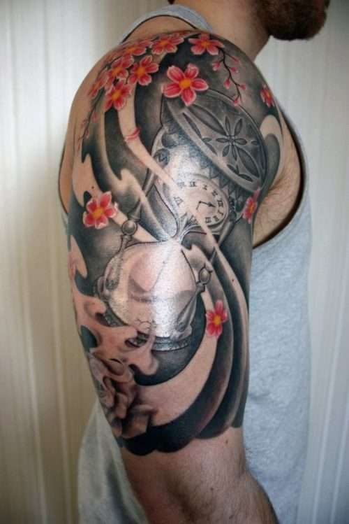Tatuaje flores de cerezo y reloj de arena