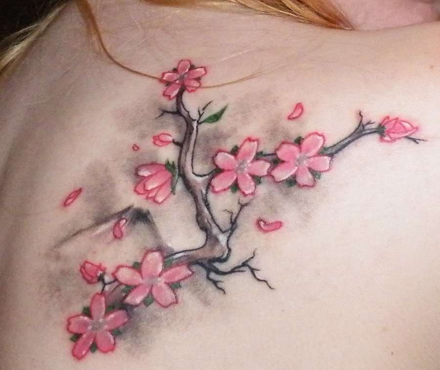 Tatuaje rama de cerezo con flores
