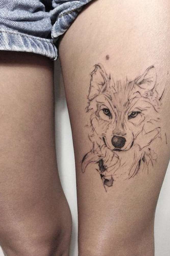 Tatuaje en el muslo - lobo