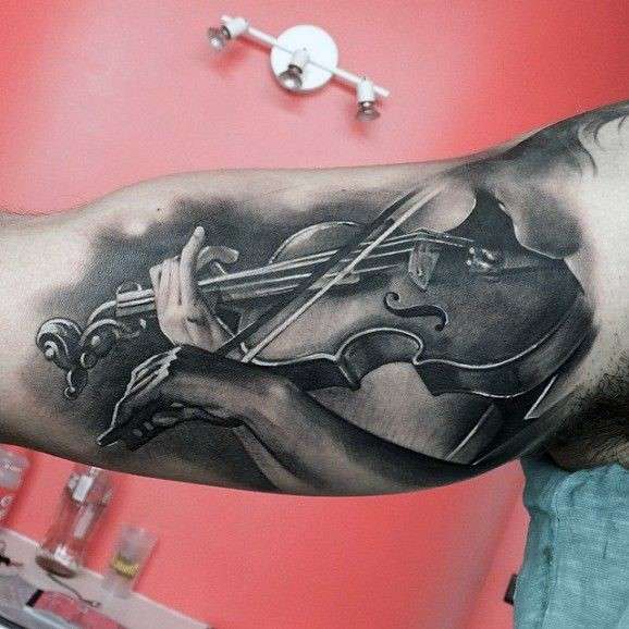 Tatuajes de música: violín en el brazo