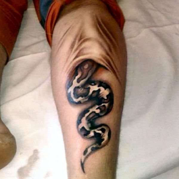 Funny tattoos: snake in the arm