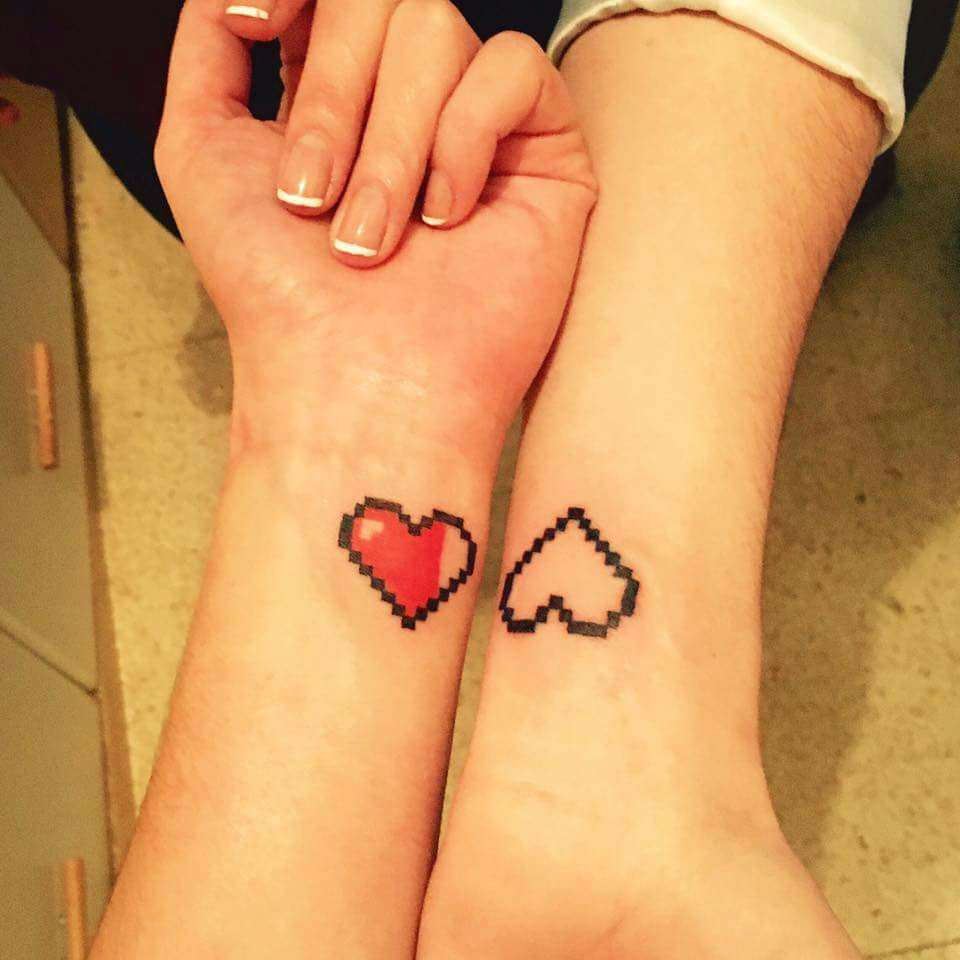 Tatuaje de corazón en pareja