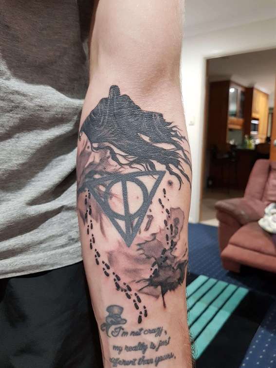 Tatuaje de Harry Potter en el antebrazo