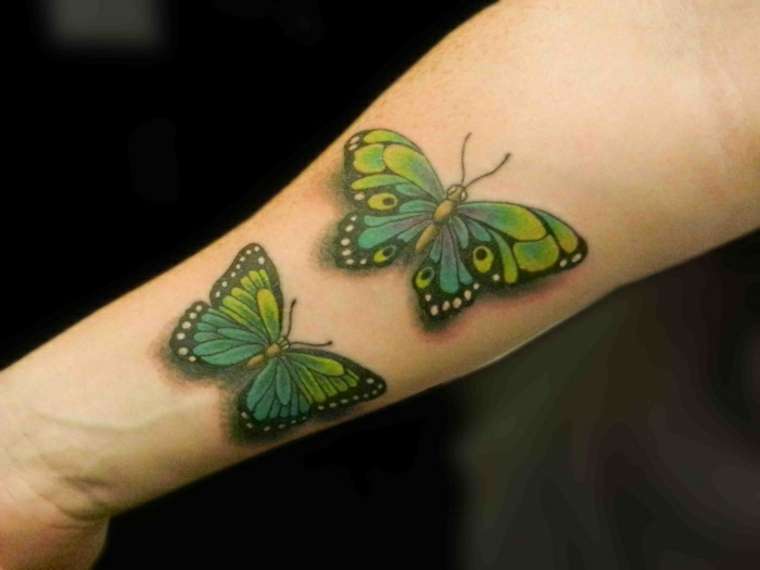 Tatuaje de mariposas verdes