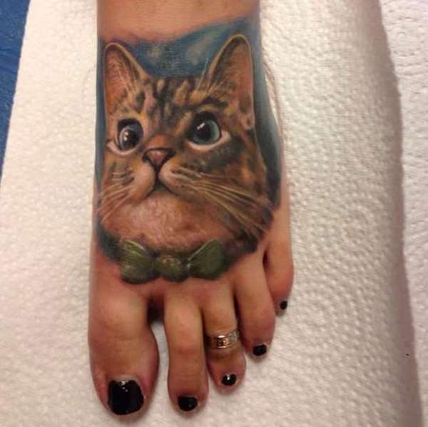 Tatuaje de gato en el pie