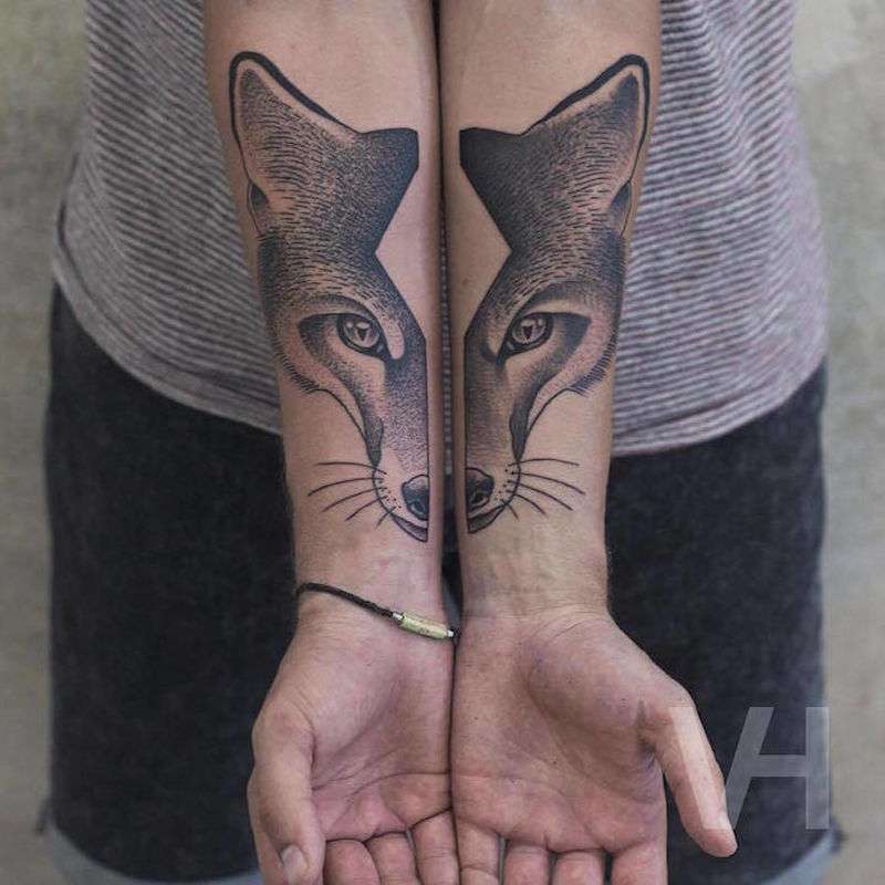 Tatuajes de animales: lobo en los brazos