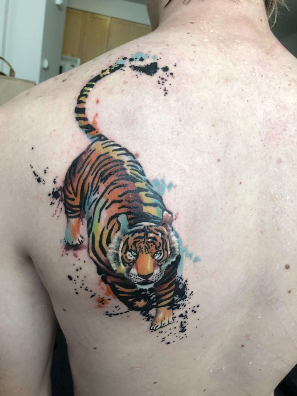 Tatuaje de tigre en la espalda