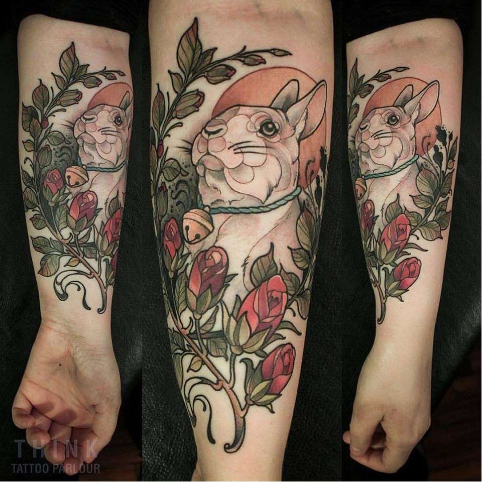 Tatuajes de animales: conejo y flores