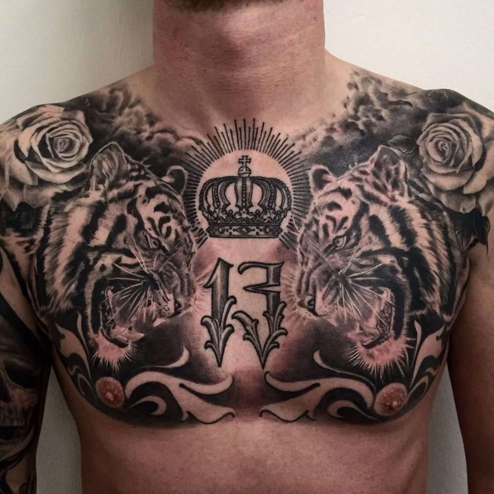 Tatuaje de tigres en el pecho